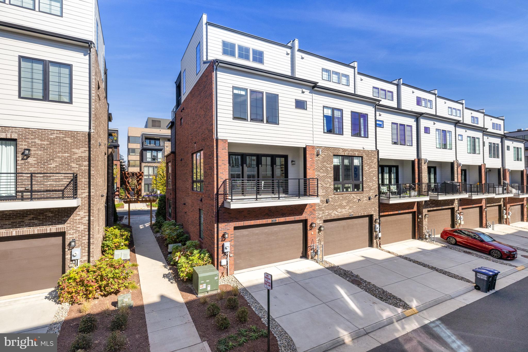 11723 Paysons Way Reston, VA 20191 - Photo 36 of 51 a front view of a building with street
