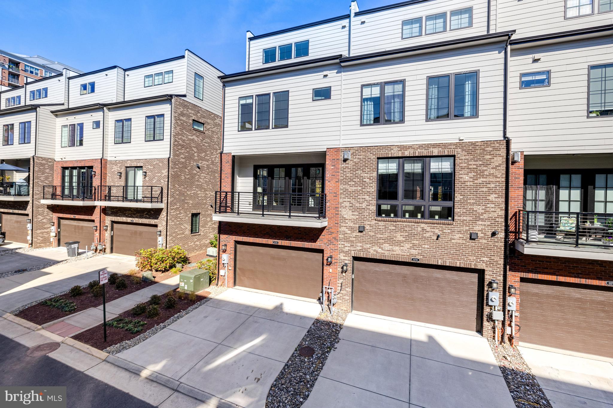 11723 Paysons Way Reston, VA 20191 - Photo 37 of 51 a view of a building with sitting area