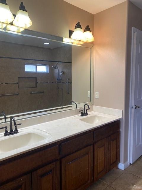 1220 Eva Street Edinburg, TX 78539 - Photo 12 of 21 a bathroom with a sink and a mirror