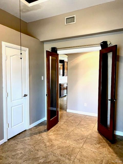 1220 Eva Street Edinburg, TX 78539 - Photo 15 of 21 a view of an empty room with wooden floor and a window