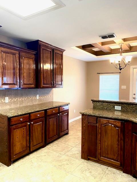 1220 Eva Street Edinburg, TX 78539 - Photo 6 of 21 a kitchen with a sink and cabinets