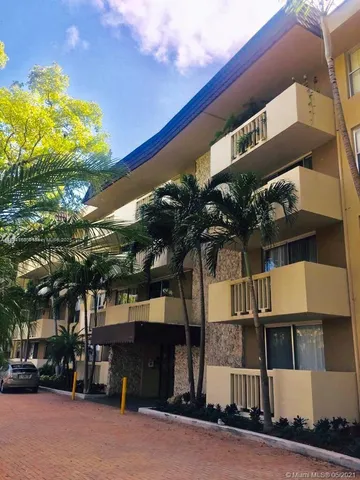 a view of a building with a street