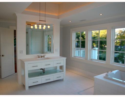 Undisclosed Address Darien, CT 06820 - Photo 6 of 10 a bathroom with a sink and a mirror