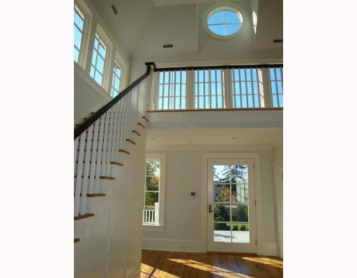 Undisclosed Address Darien, CT 06820 - Photo 7 of 10 a view of a livingroom with stairs