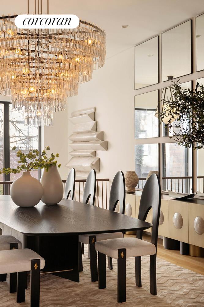 53 West 71st Street Manhattan, NY 10023 - Photo 10 of 41 a dining room with furniture and wooden floor