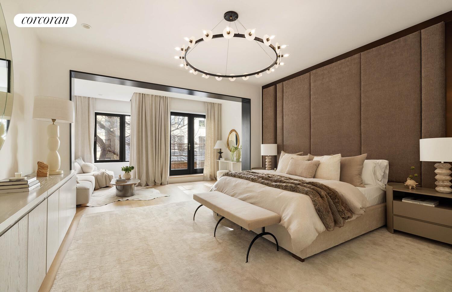 53 West 71st Street Manhattan, NY 10023 - Photo 18 of 41 a spacious bedroom with a bed a mirror and furniture