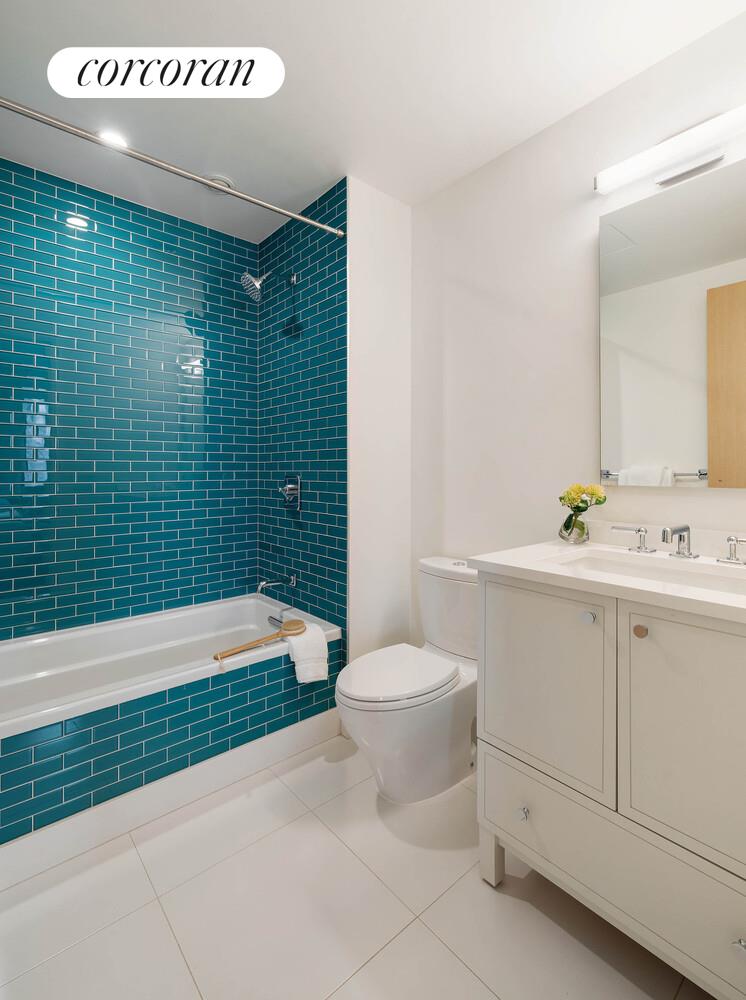 53 West 71st Street Manhattan, NY 10023 - Photo 35 of 41 a bathroom with a sink a toilet and shower