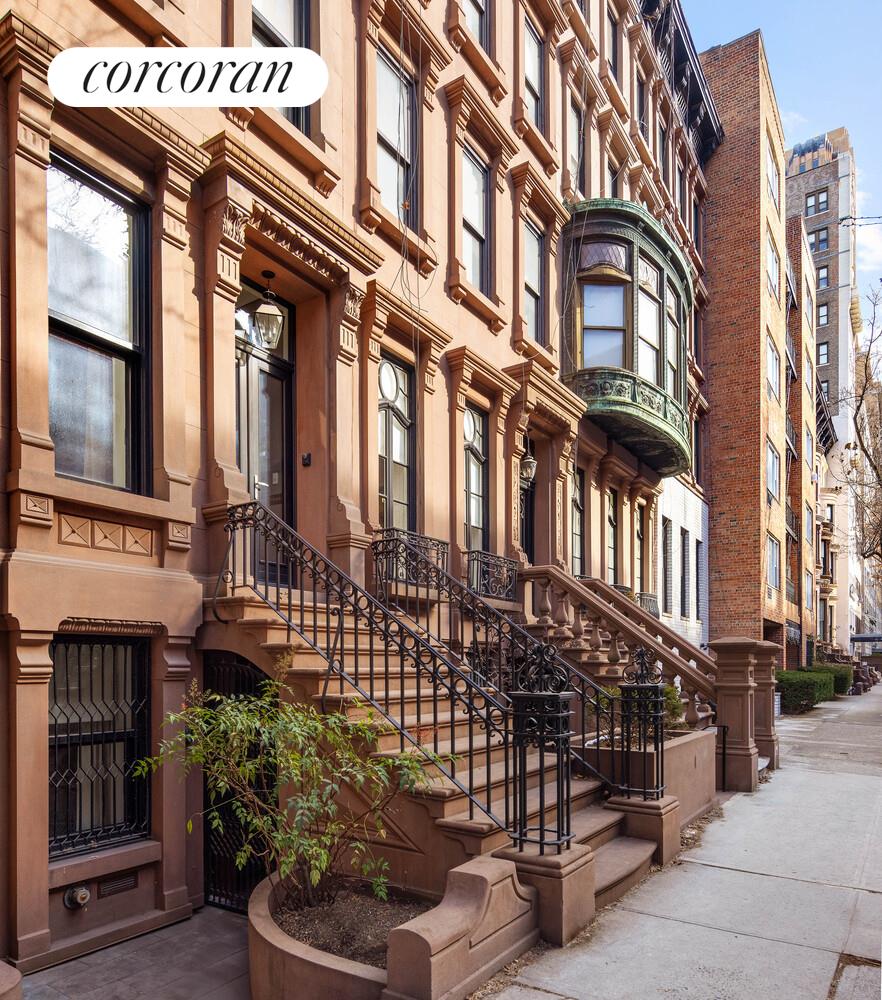 53 West 71st Street Manhattan, NY 10023 - Photo 3 of 41 a front view of a building with glass windows