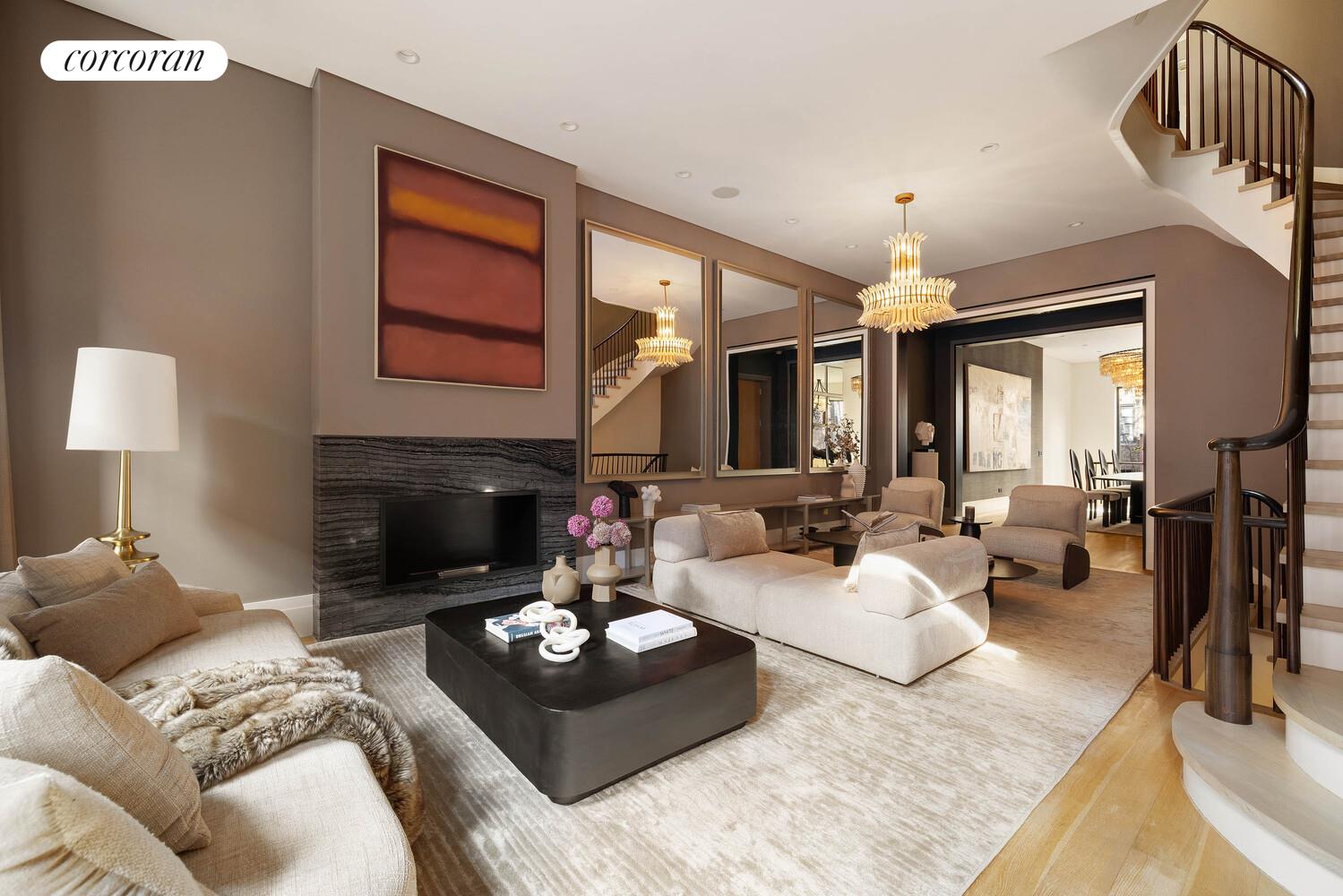 53 West 71st Street Manhattan, NY 10023 - Photo 6 of 41 a living room with furniture fireplace and a lamp