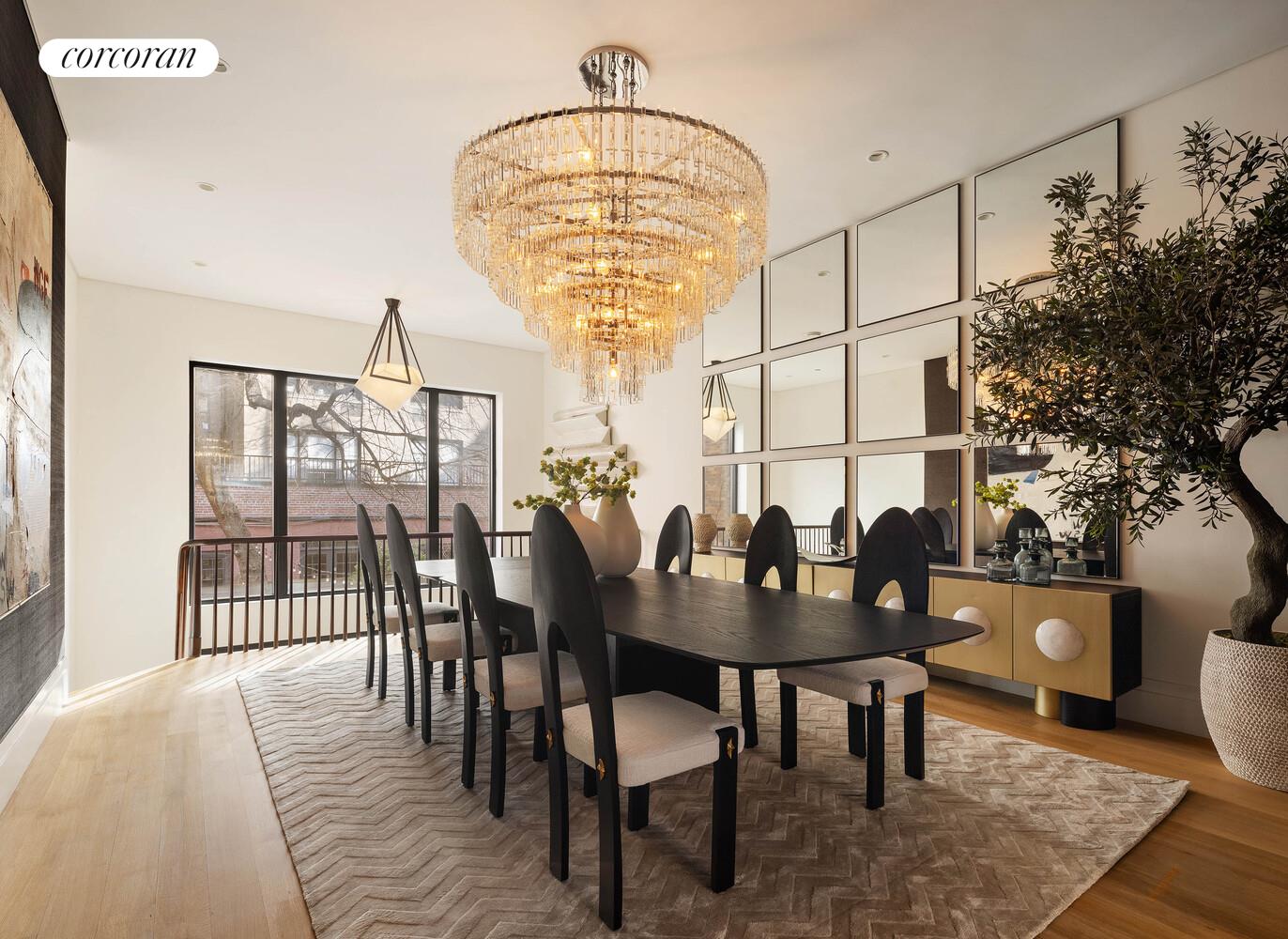 53 West 71st Street Manhattan, NY 10023 - Photo 9 of 41 a view of a dining room with furniture and wooden floor