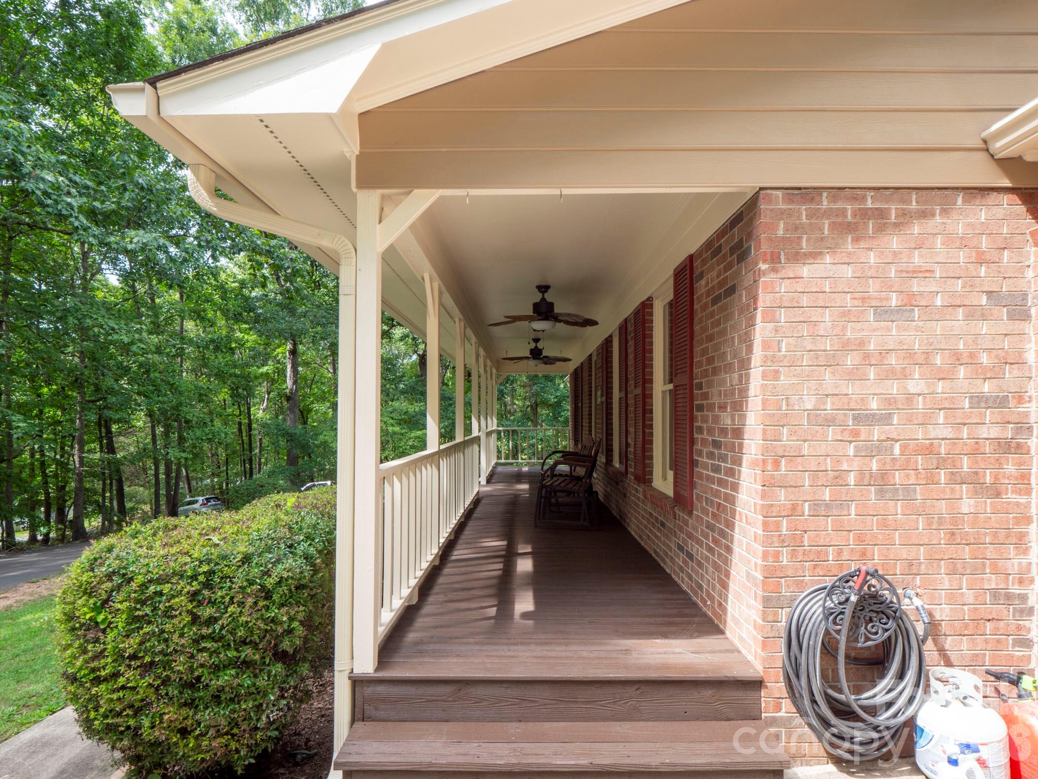 8720 Unionville-Brief Road Monroe, NC 28110 - Photo 5 of 35 a view of a porch with furniture