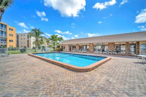 a swimming pool with outdoor space