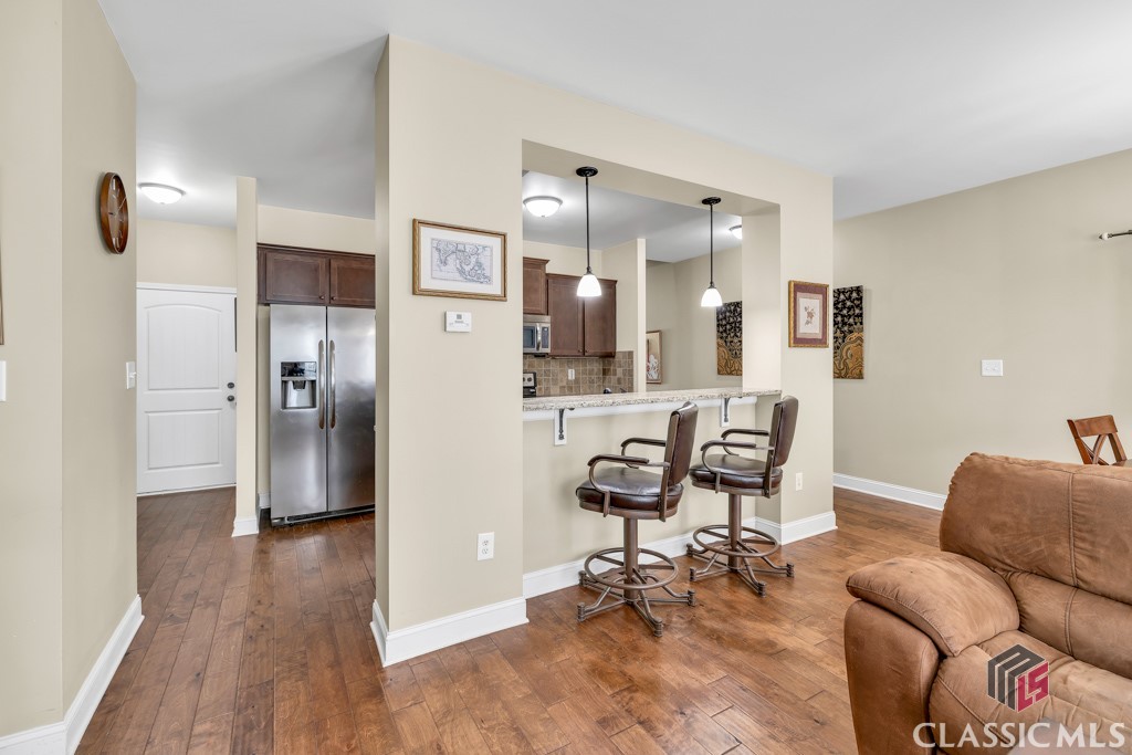 1102 Blackstone Way Atlanta, GA 30339 - Photo 19 of 43 Hall with Half bath, walk-in Pantry and Storage Room