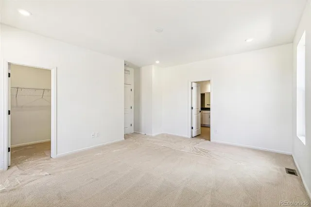 an empty room with an entryway