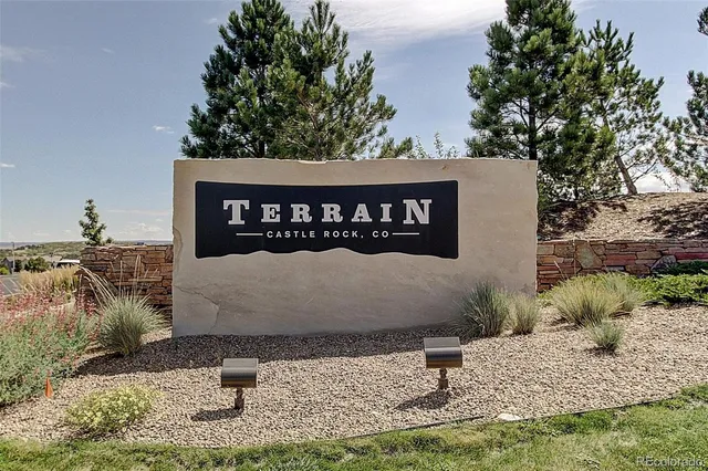 a sign broad on the side of the road