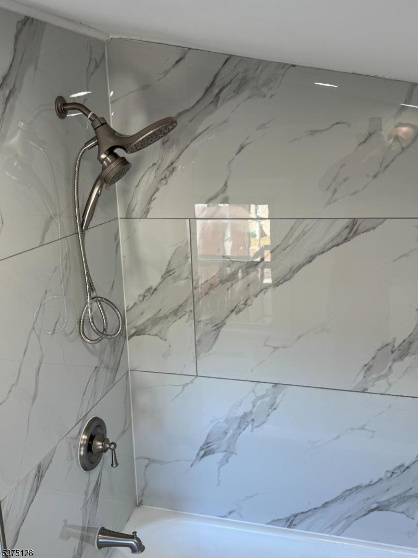 183 Main Street Hackettstown, NJ 07840 - Photo 11 of 12 a bathroom with a shower