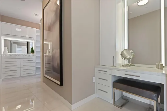 a bathroom with a toilet a sink and glass door