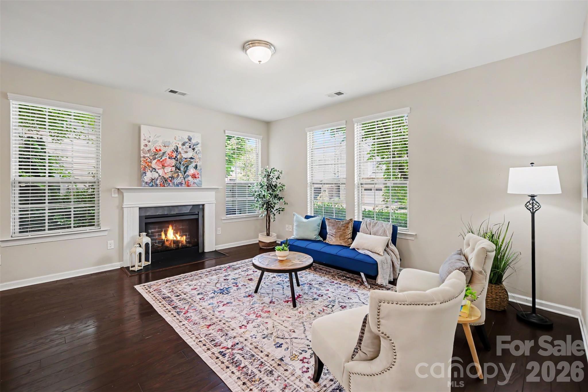 1029 Archibald Avenue Fort Mill, SC 29708 - Photo 4 of 45 a living room with furniture and a fireplace