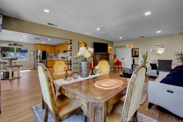 a view of a kitchen with furniture and a kitchen