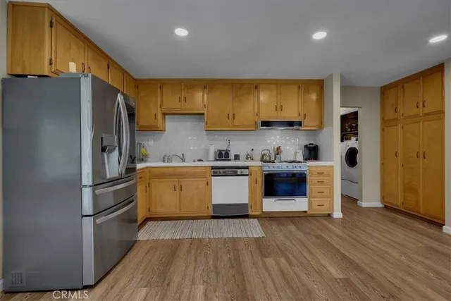 a bed room with a bed and a dresser