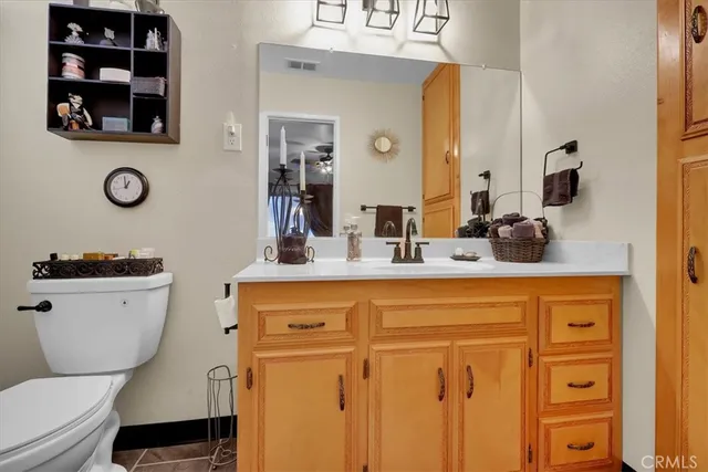 a view of a chairs and table in the balcony