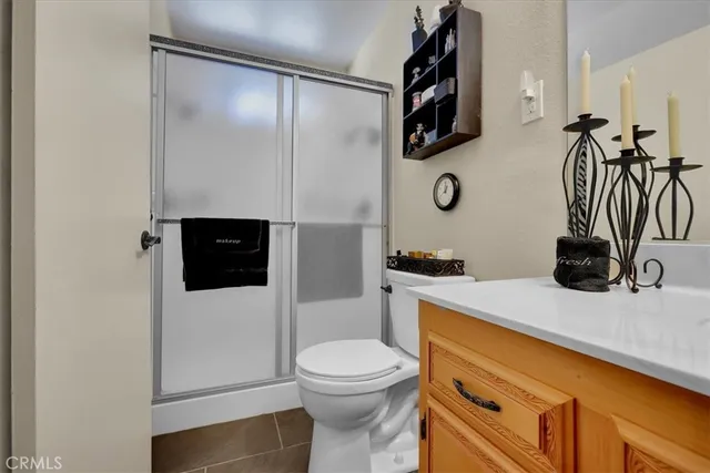 a path view of a house with a street