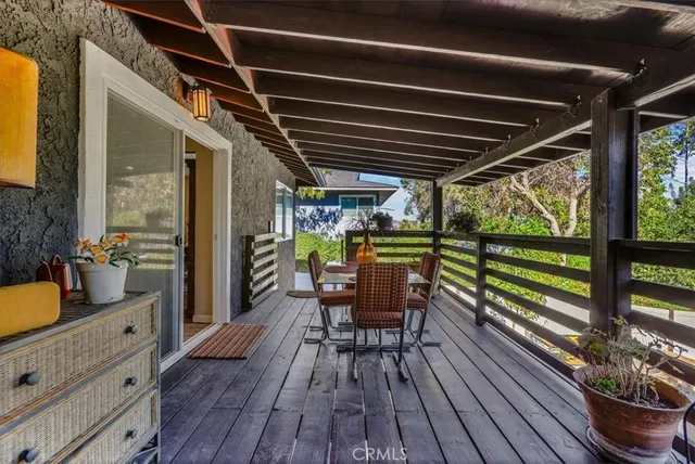 an aerial view of a houses with a city