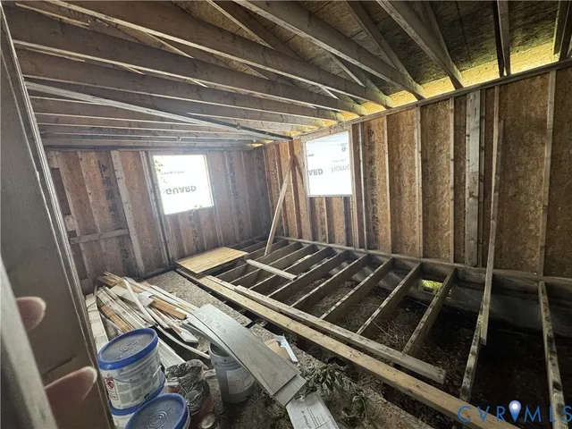 a bed sitting on a balcony
