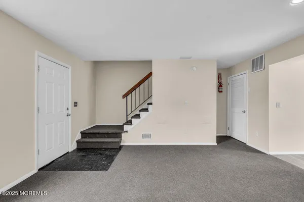 a view of an entryway with stairs