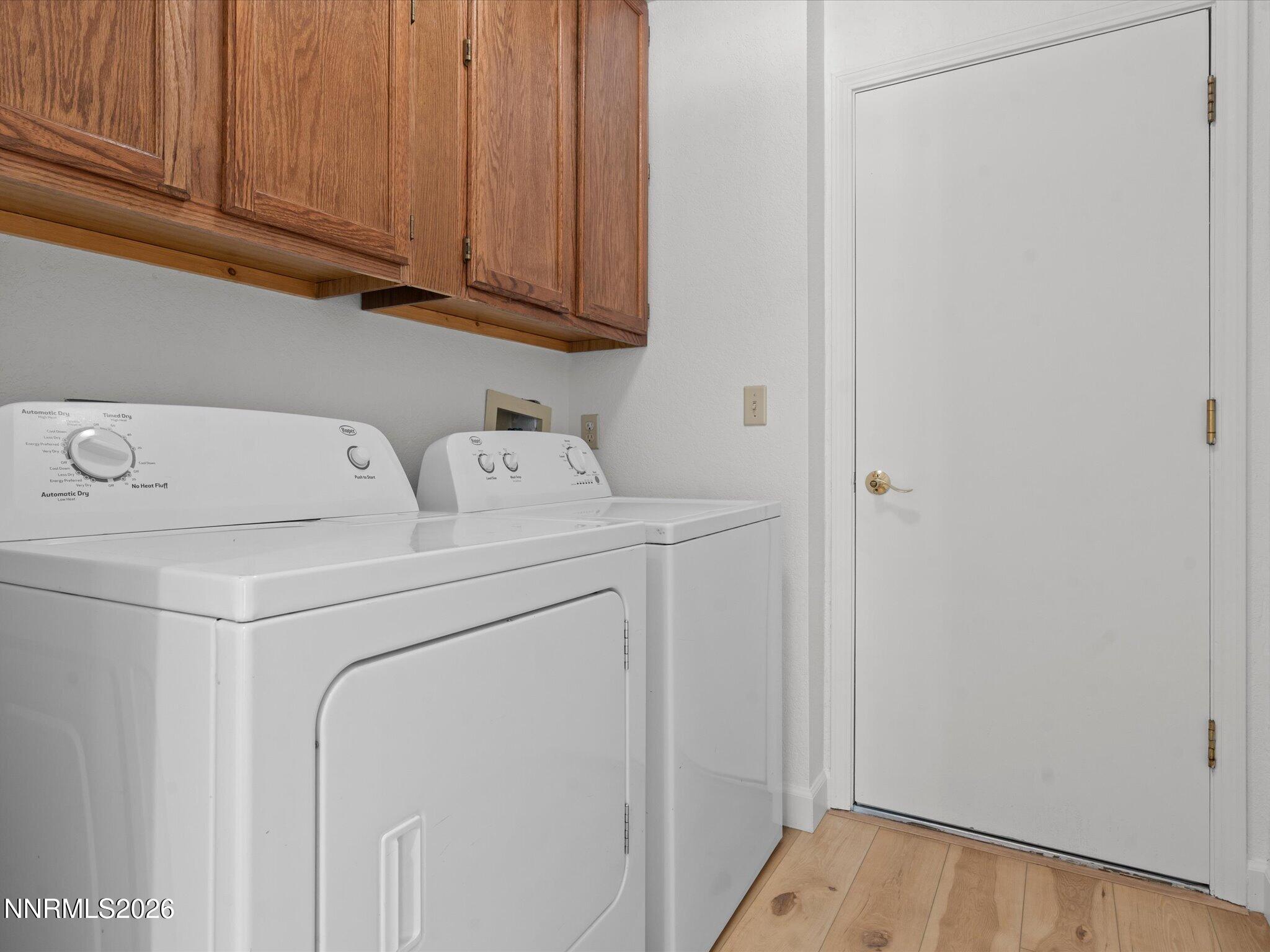 3170 Oakshire Court Reno, NV 89509 - Photo 42 of 43 a utility room with dryer and washer