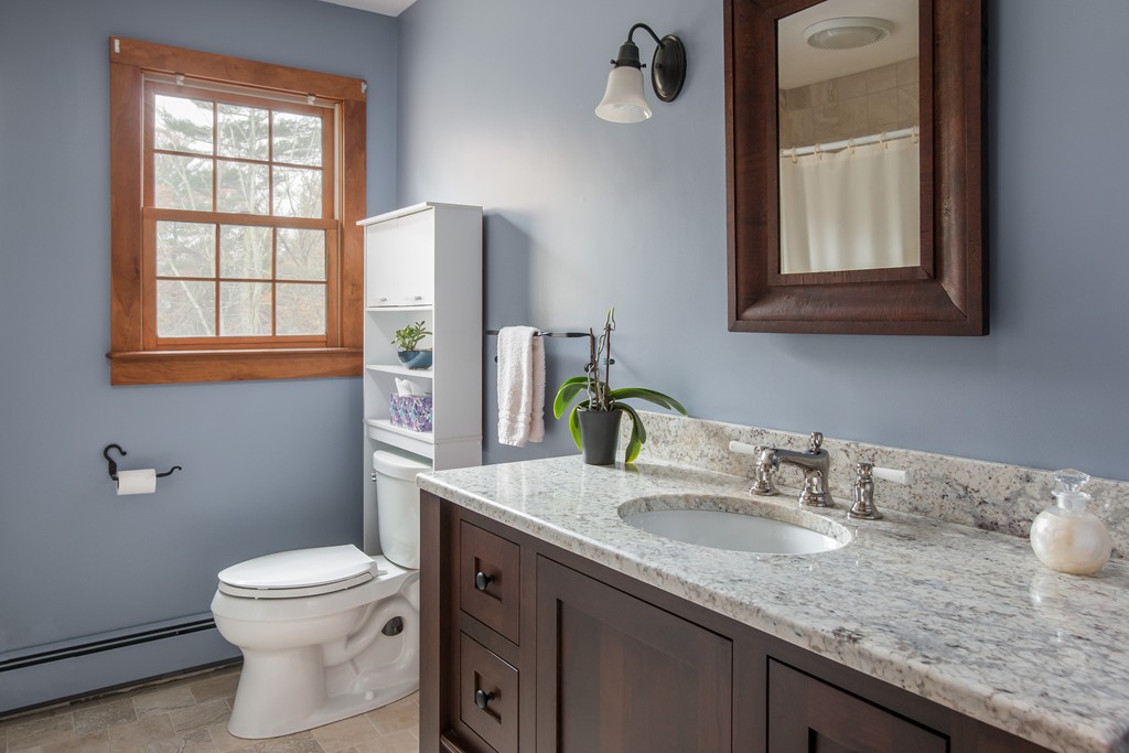32 Blanchard Road Grafton, MA 01519 - Photo 22 of 30 a bathroom with a granite countertop sink toilet and mirror