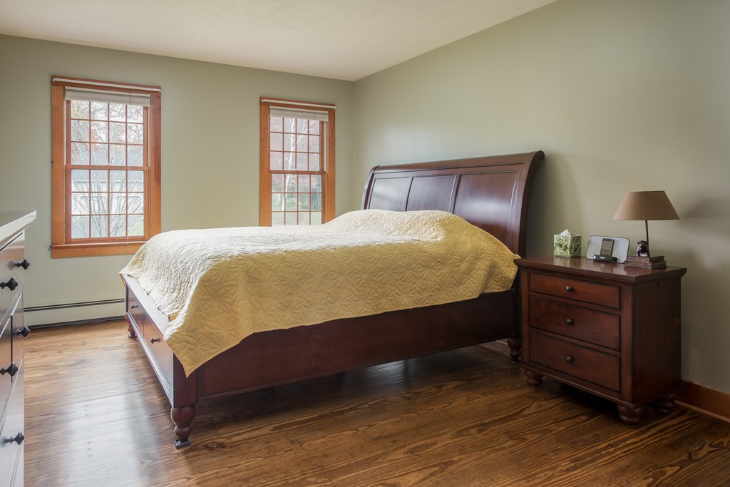 32 Blanchard Road Grafton, MA 01519 - Photo 25 of 30 a bedroom with a bed and window