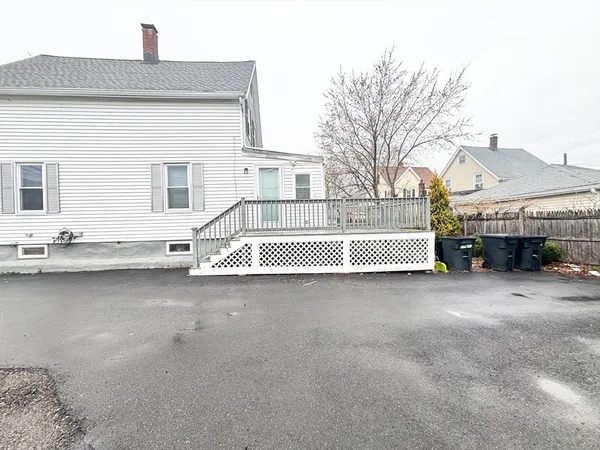 a view of a street with a house