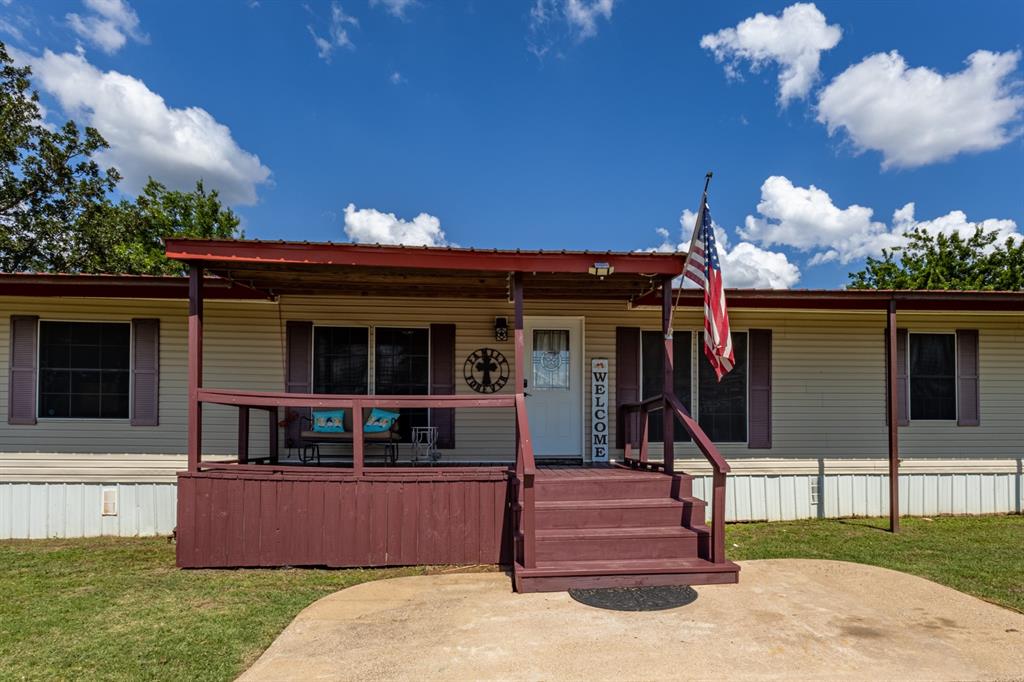 75 Southern Road Mineral Wells, TX 76067 - Photo 1 of 31 a front view of a house
