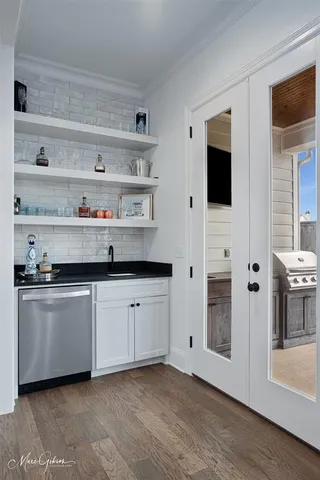 a kitchen with stainless steel appliances a stove and a refrigerator