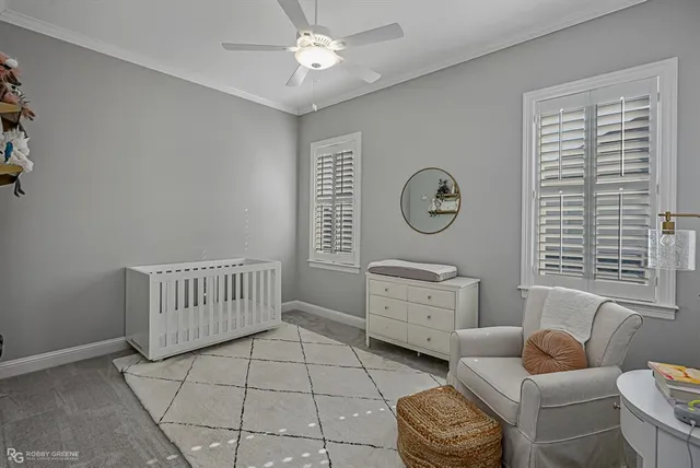 a room with furniture and a large window