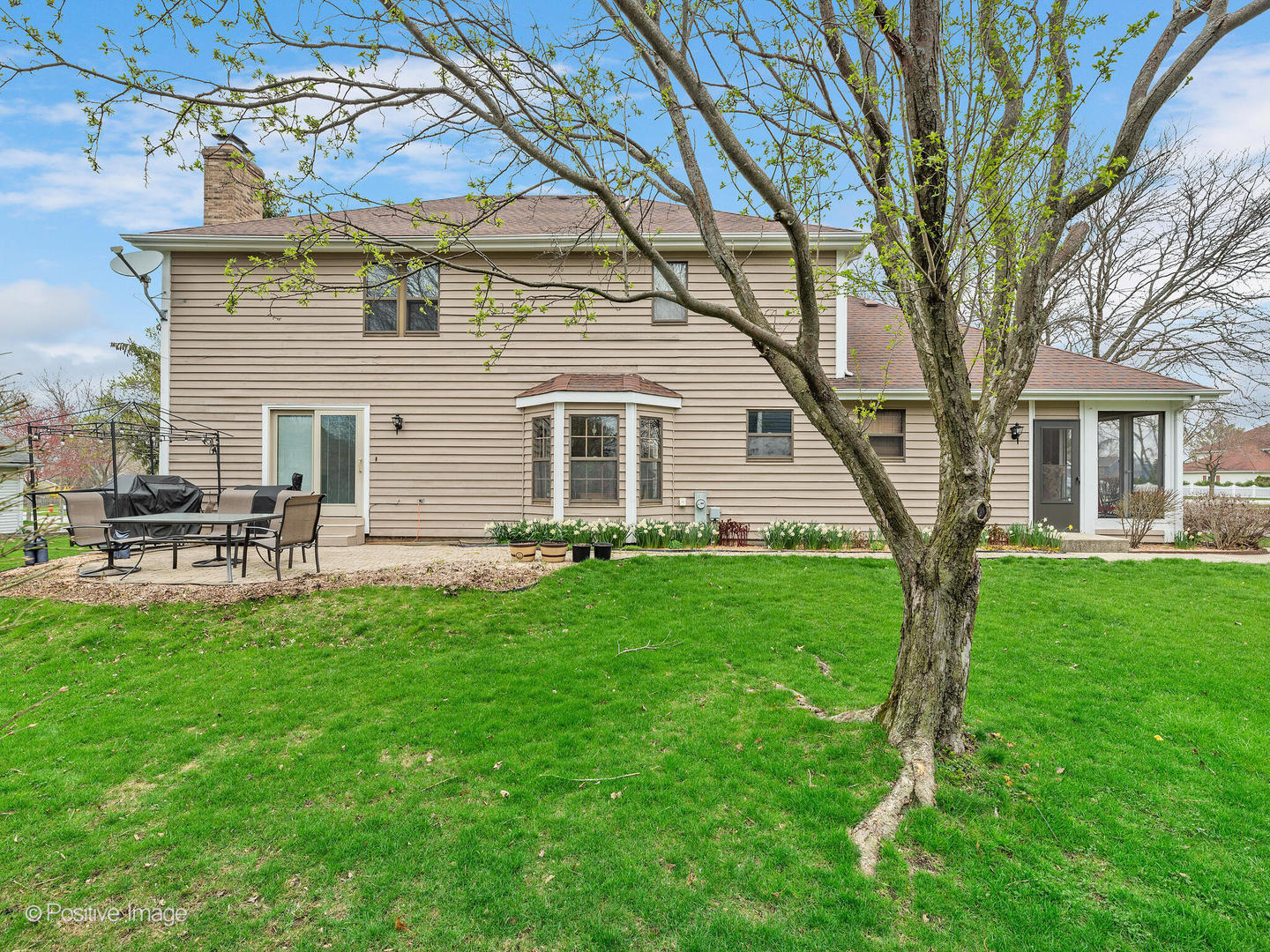1720 East Bailey Road Naperville, IL 60565 - Photo 27 of 31 a backyard of a house with table and chairs