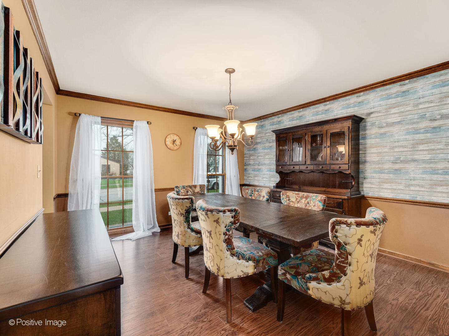 1720 East Bailey Road Naperville, IL 60565 - Photo 7 of 31 a living room with furniture a window and a flat screen tv