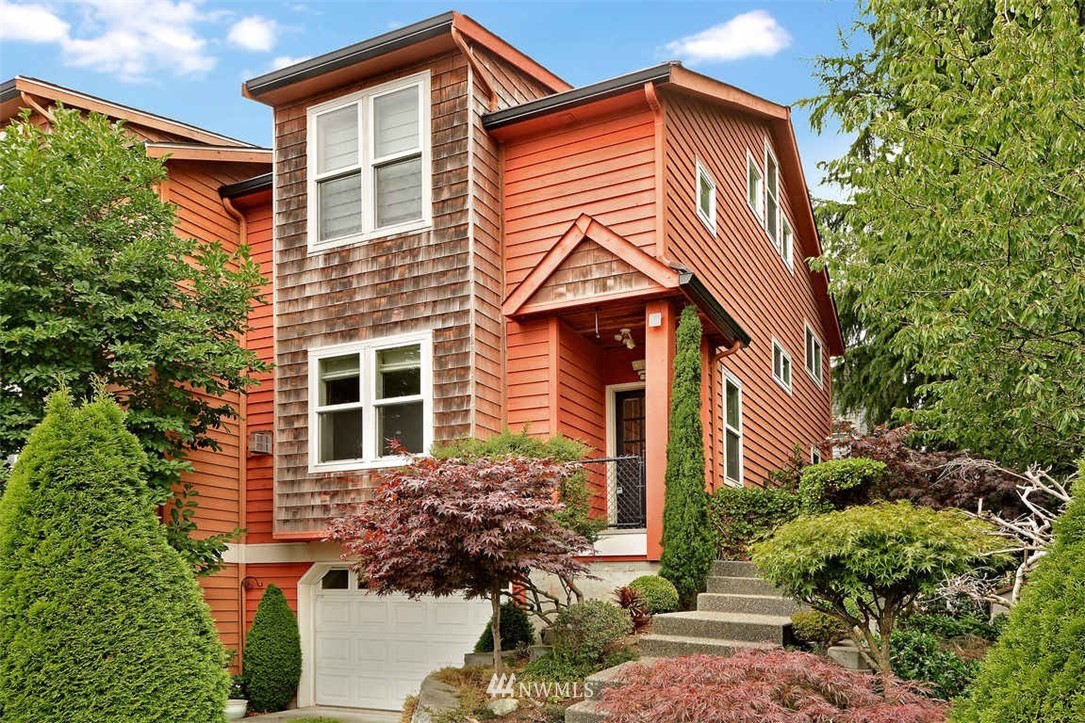308 North 133rd Street Seattle, WA 98133 - Photo 1 of 18 a front view of a house with a yard