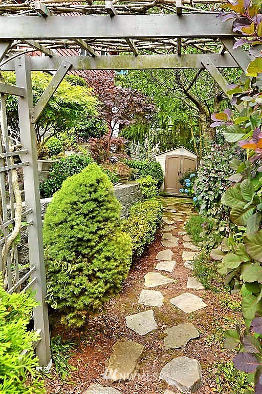 308 North 133rd Street Seattle, WA 98133 - Photo 15 of 18 a picture of a yard with plants