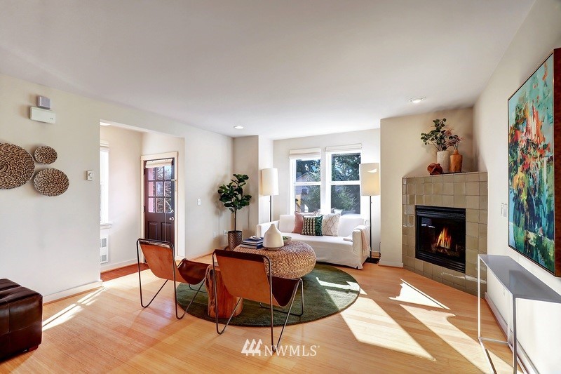 308 North 133rd Street Seattle, WA 98133 - Photo 5 of 18 a living room with furniture and a fireplace