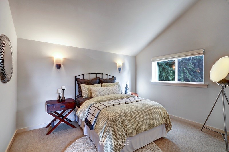308 North 133rd Street Seattle, WA 98133 - Photo 10 of 18 a bedroom with a bed and a window
