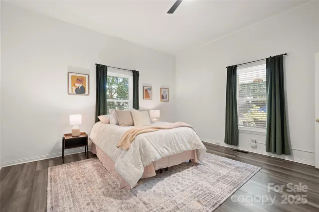 a bed room with a bed and a window