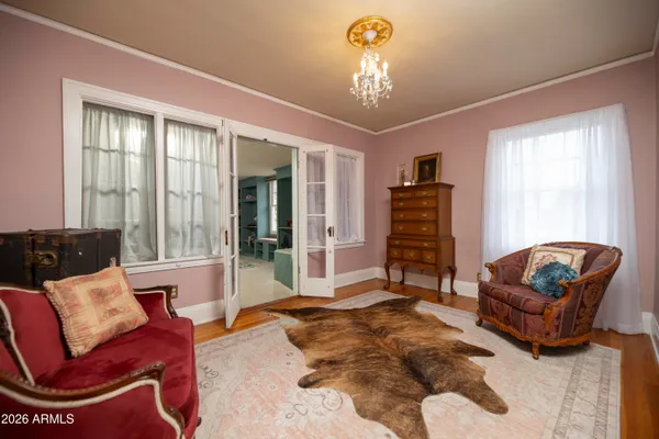 a view of a house with a backyard porch and sitting area