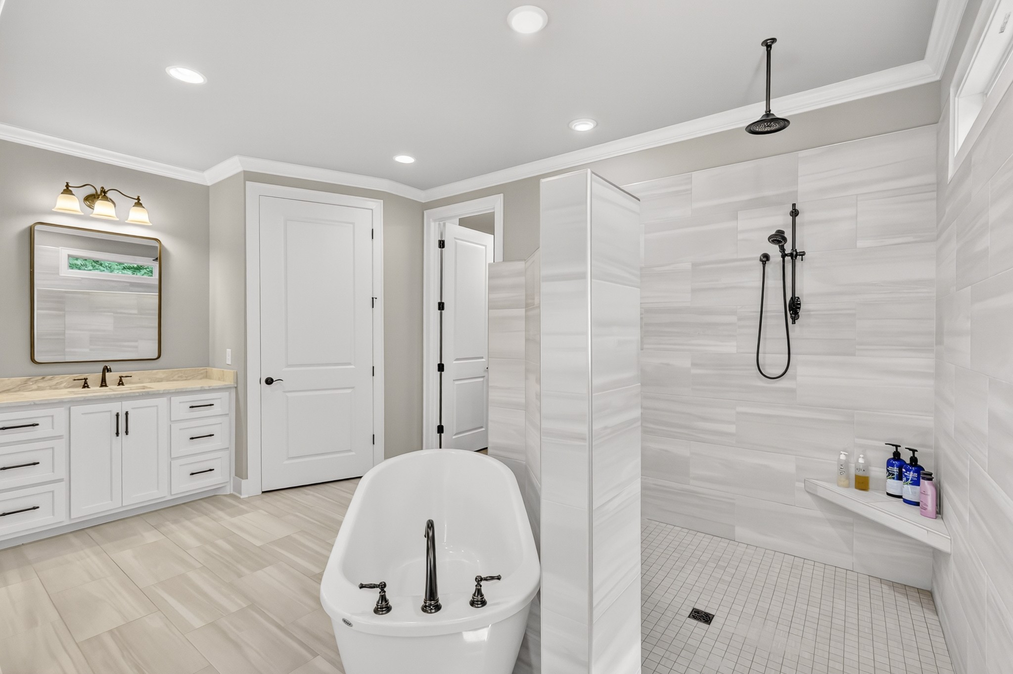 1176 Iron Bridge Road Columbia, TN 38401 - Photo 31 of 53 a bathroom with a tub sink and mirror