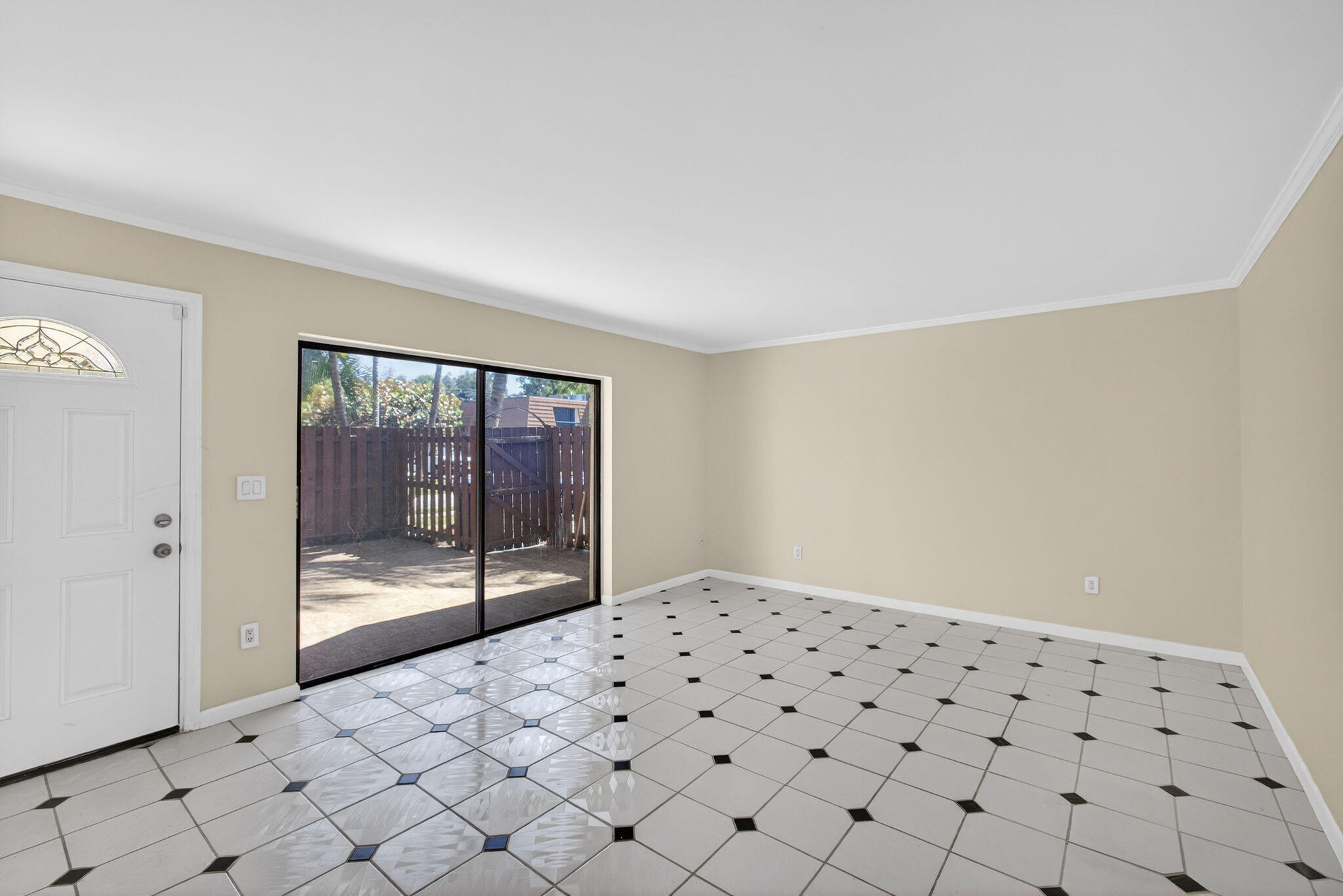 825 Center Street, Unit 9A Jupiter, FL 33458 - Photo 12 of 52 a bedroom with a bed and a window