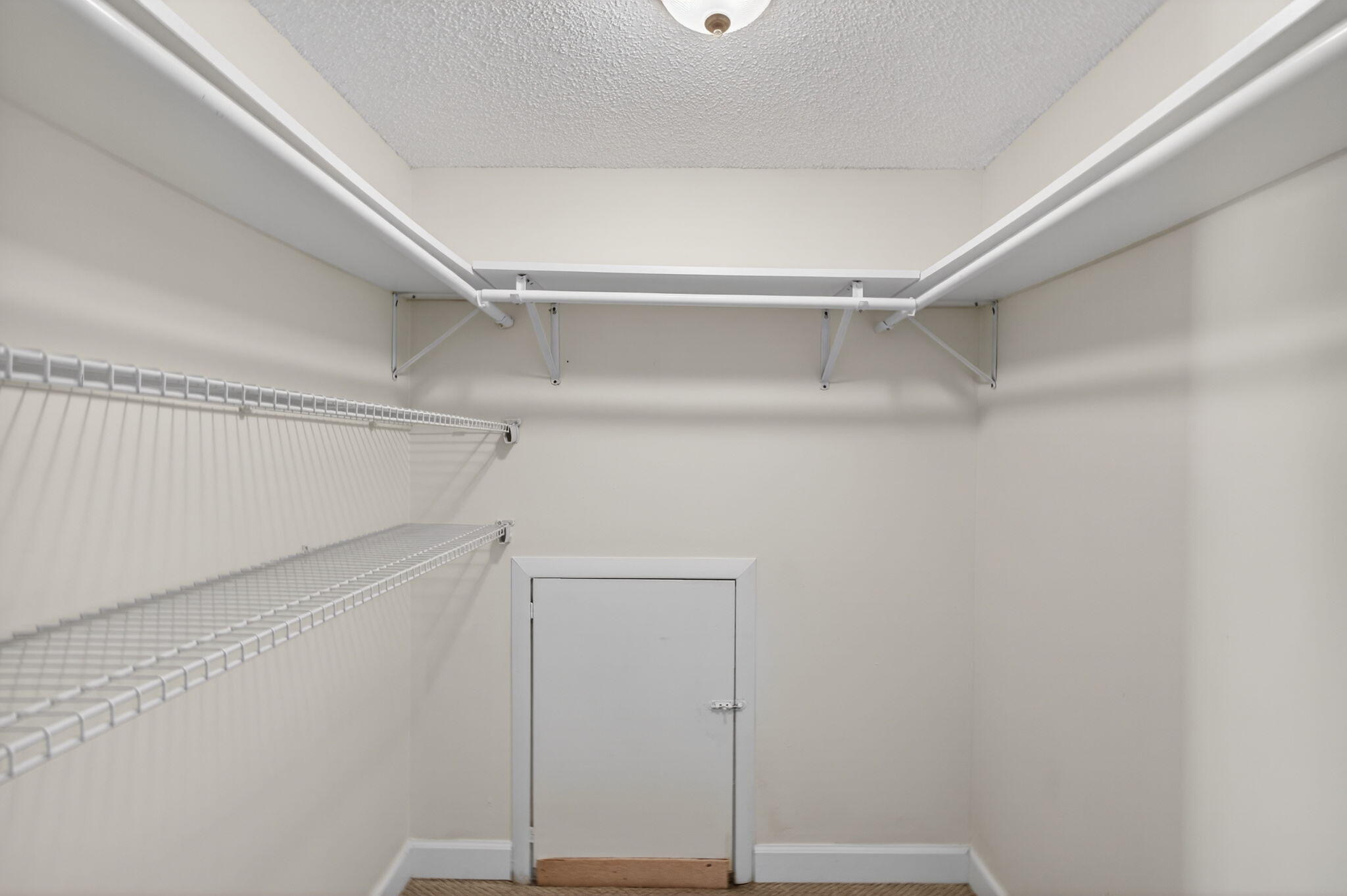 825 Center Street, Unit 9A Jupiter, FL 33458 - Photo 28 of 52 a view of an empty walk in closet