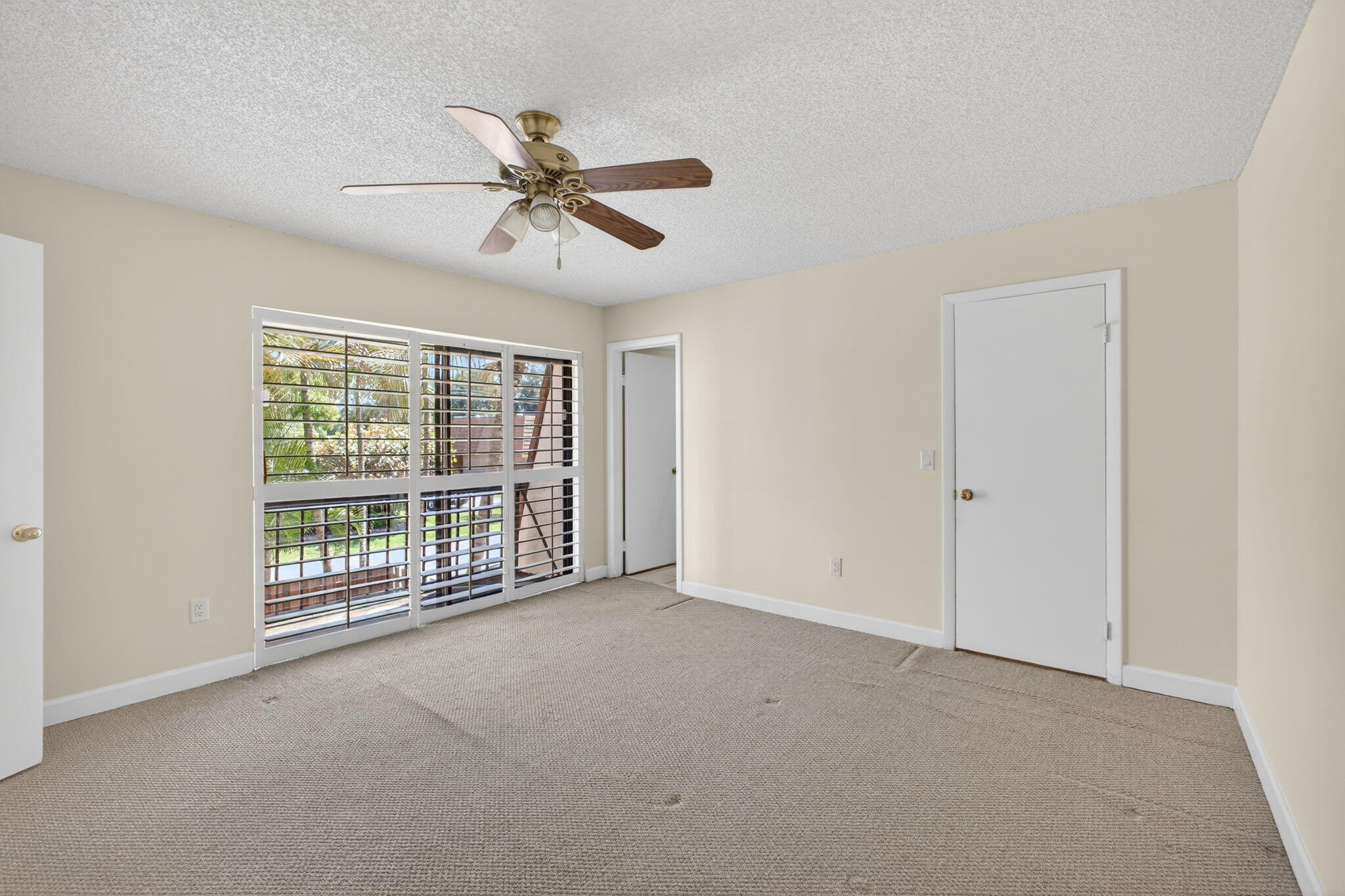 825 Center Street, Unit 9A Jupiter, FL 33458 - Photo 29 of 52 a view of an empty room with a window