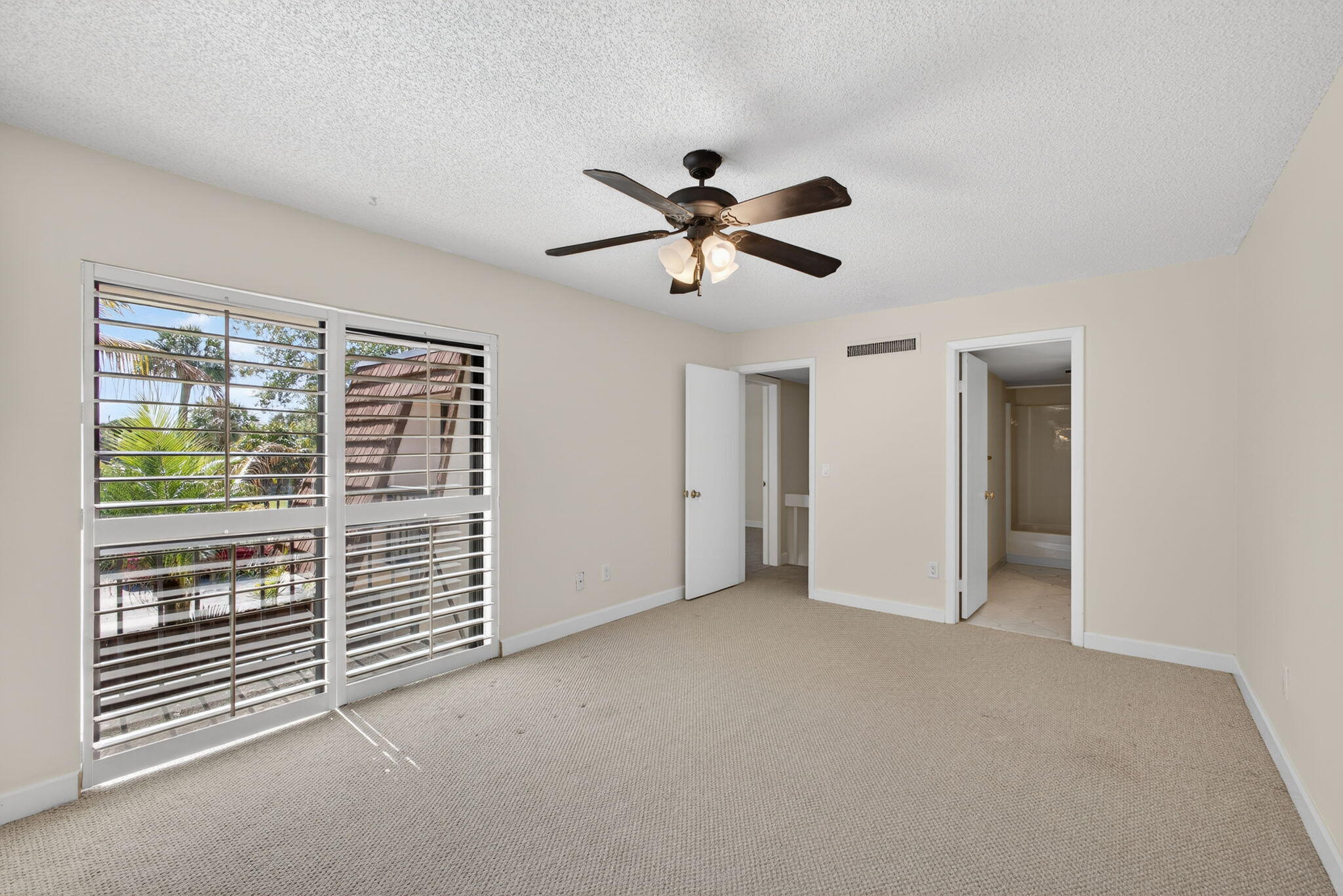 825 Center Street, Unit 9A Jupiter, FL 33458 - Photo 35 of 52 a view of empty room with ceiling fan