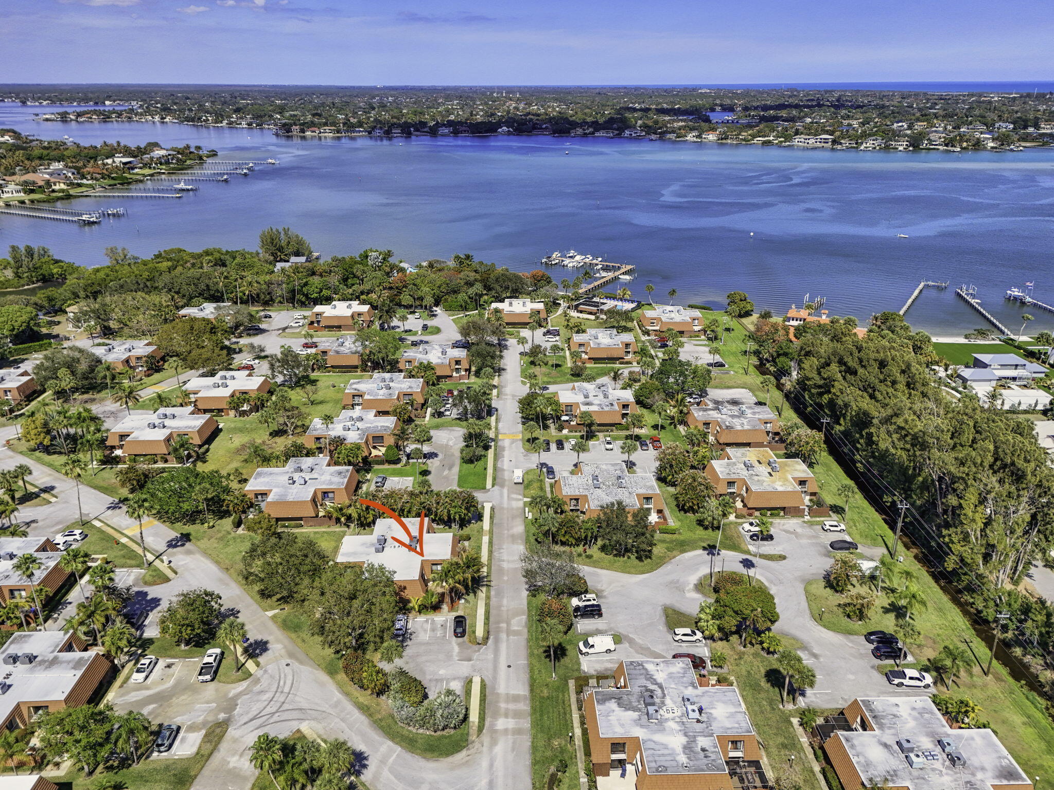 825 Center Street, Unit 9A Jupiter, FL 33458 - Photo 45 of 52 an aerial view of a house with a garden